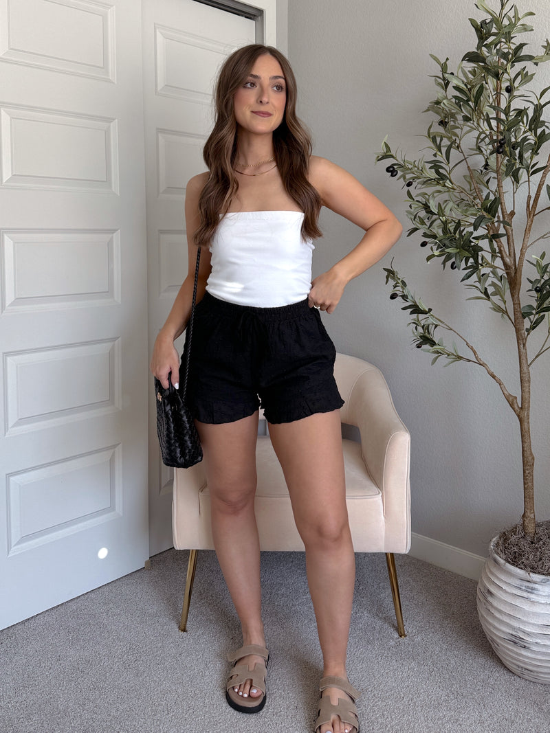 Maggie Eyelet Ruffle Hem Cotton Shorts (Black)