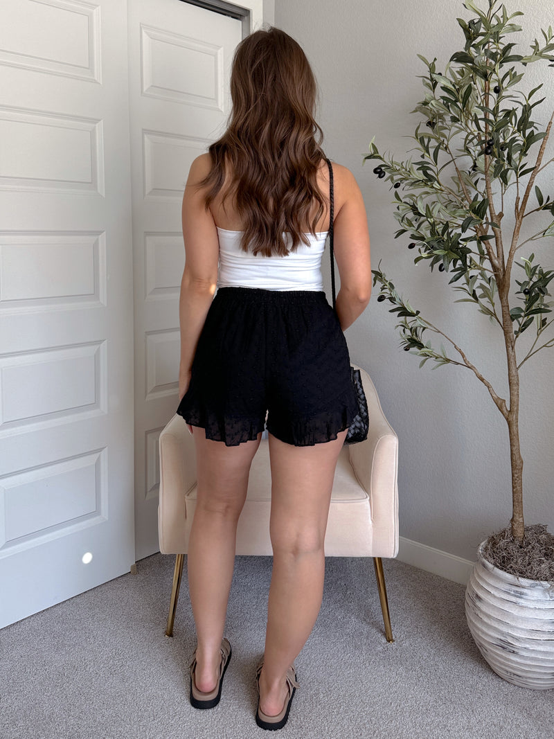 Maggie Eyelet Ruffle Hem Cotton Shorts (Black)