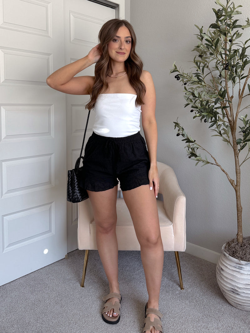 Maggie Eyelet Ruffle Hem Cotton Shorts (Black)