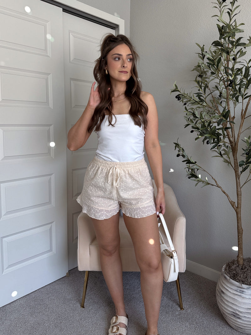 Maggie Eyelet Ruffle Hem Cotton Shorts (Light Sand)