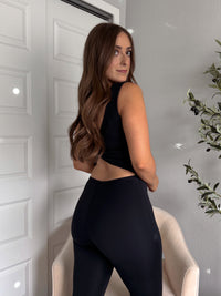 Studio Twist-Back Athleisure Flare Jumpsuit (Black)