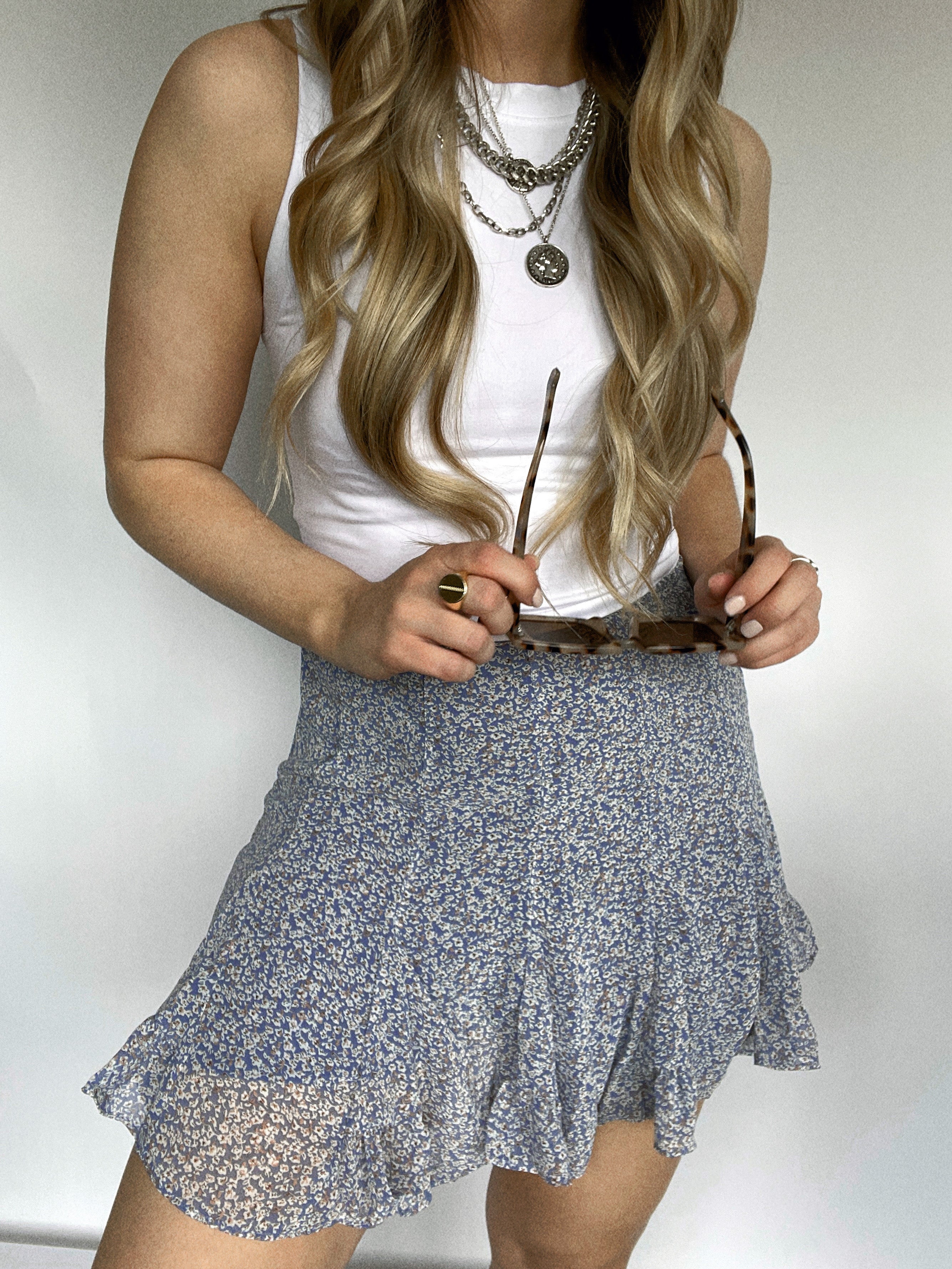 Flowy mini skirt 7 little words top
